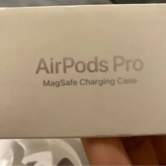 AirPod Pros, MagSafe Charging Case With Cleaning tool included.